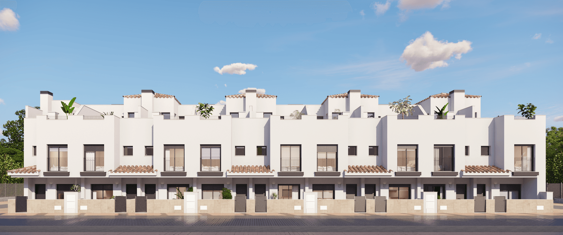 Reihenhausanlage mit moderner Architektur, weißen Fassaden und mediterranen Dachelementen.
