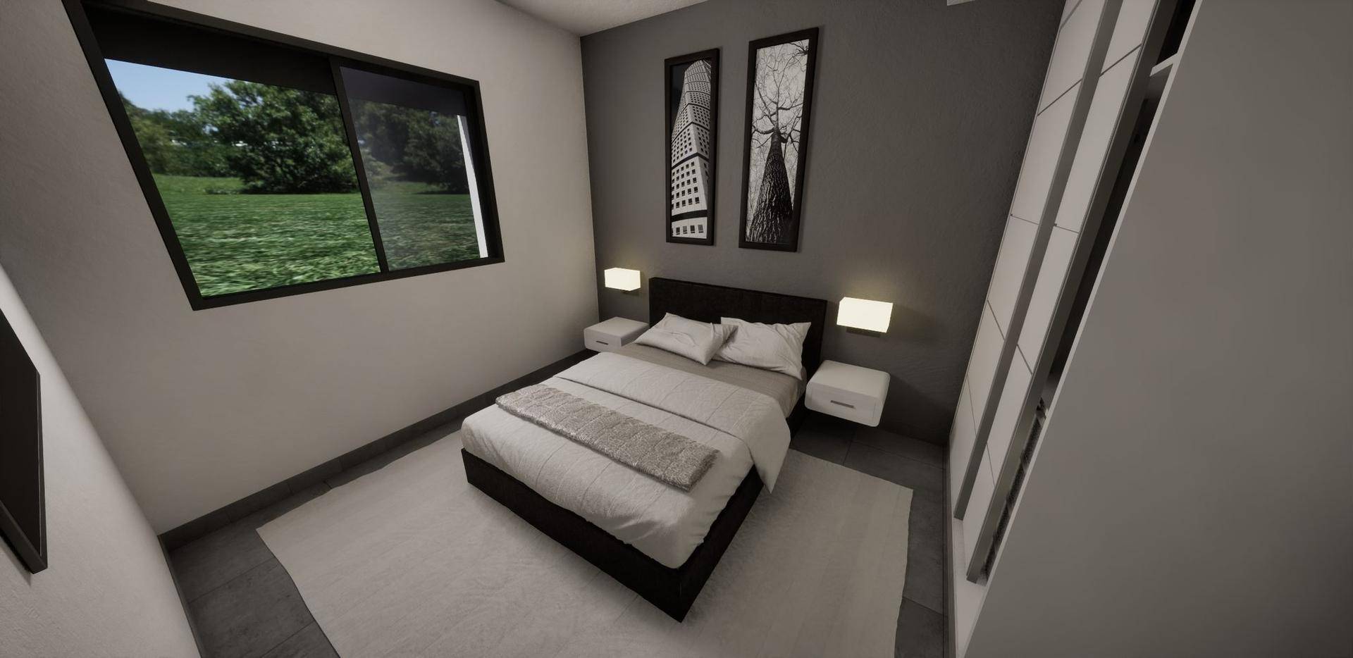 Schlafzimmer mit Doppelbett, Nachttischen und Fenster mit Blick ins Grüne.