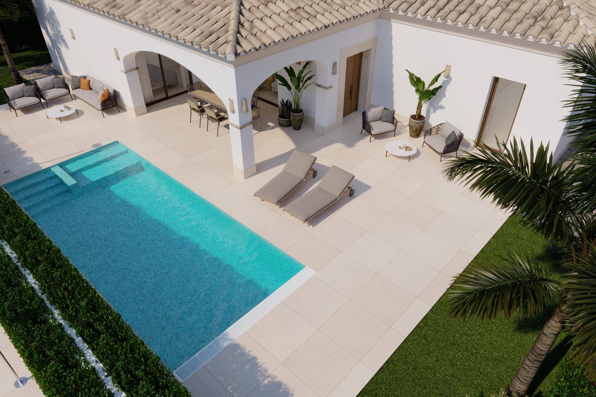 Ansicht von oben auf die Villa mit großzügiger Poollandschaft, Sonnenterrasse und gepflegtem Gartenbereich.