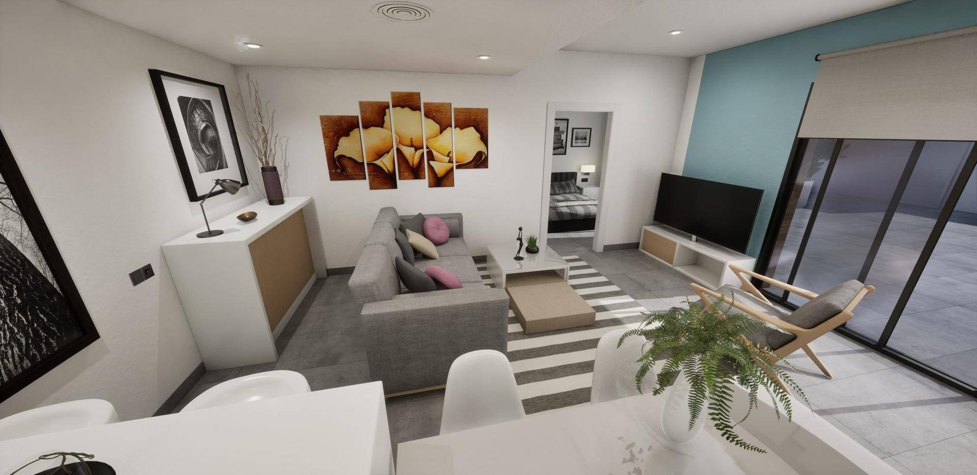 Gemütlicher Wohnbereich mit Sofa, Esstisch und Blick in den Flur und Schlafzimmer.