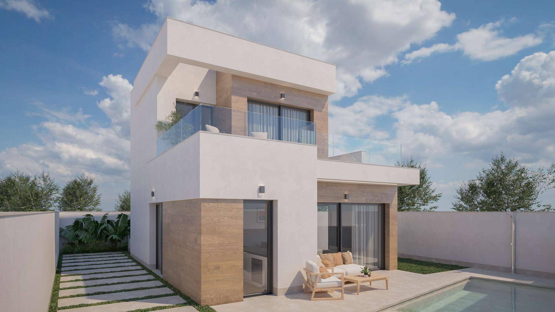Seitliche Ansicht der modernen Villa mit Poolbereich und gemütlicher Außenterrasse.