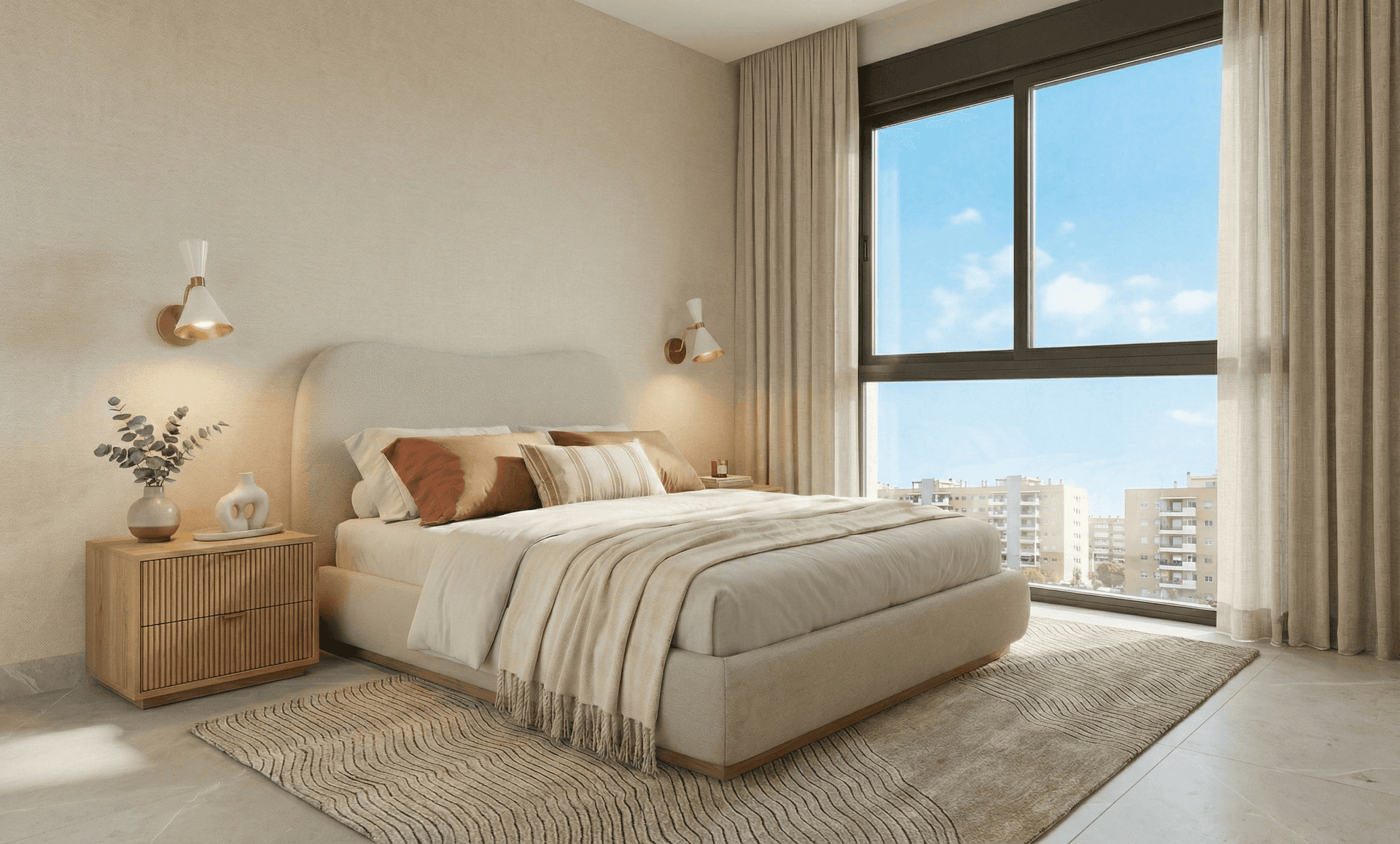 Helles Schlafzimmer mit großem Bett, Nachttischen und bodentiefen Fenstern mit Stadtblick.