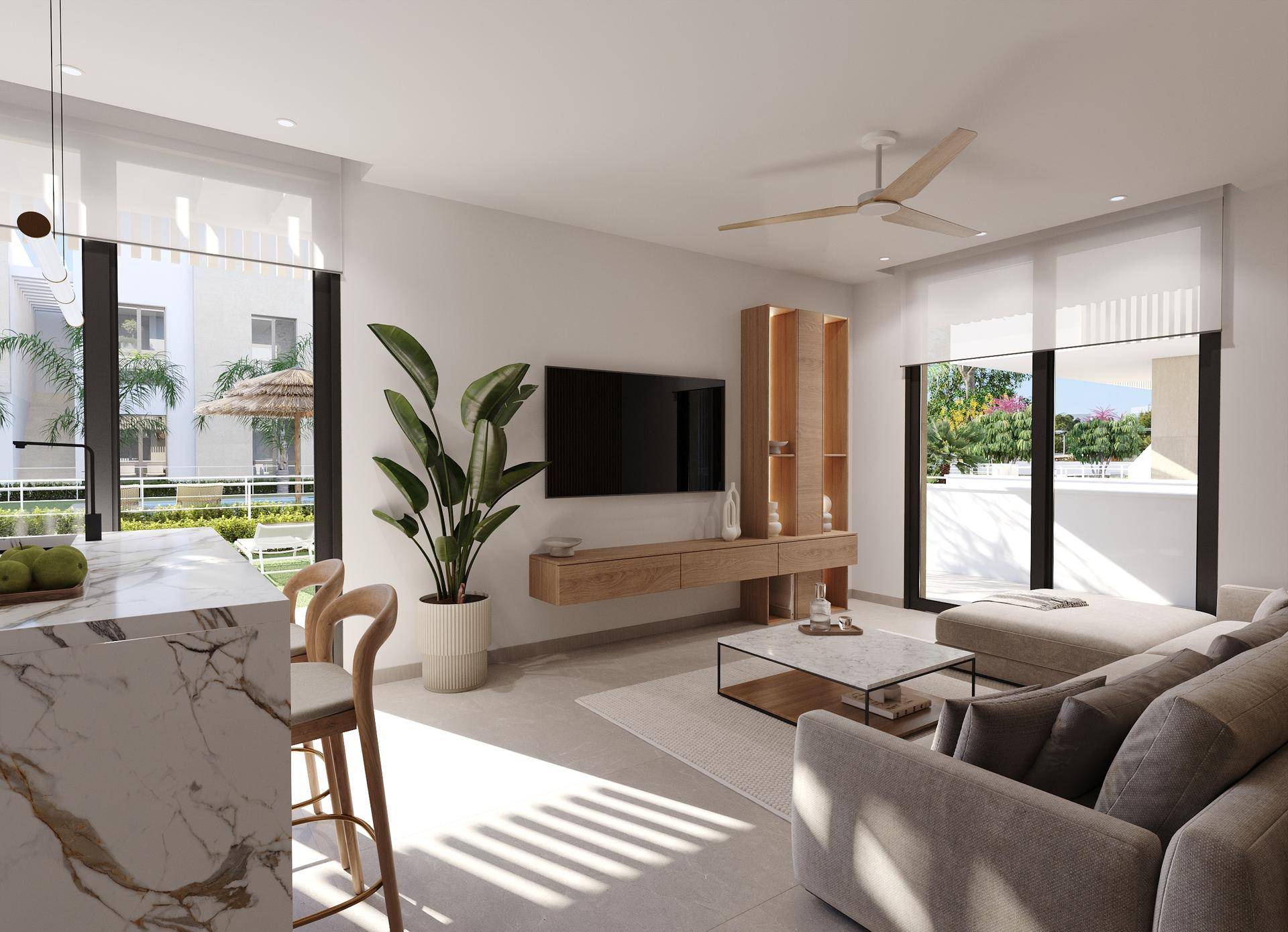 Helles, modernes Wohnzimmer mit bequemer Couch, Deckenventilator und Zugang zur Terrasse.