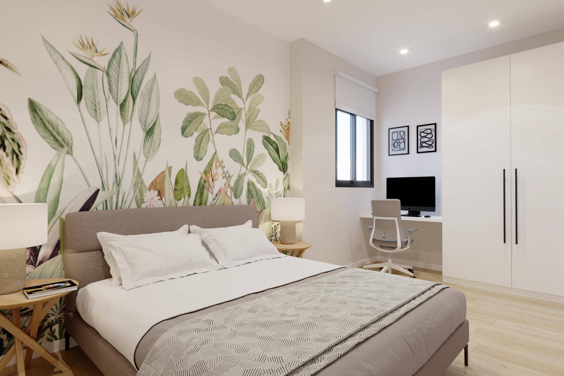 Modernes Schlafzimmer mit auffälliger botanischer Tapete, Doppelbett und integriertem Arbeitsbereich.