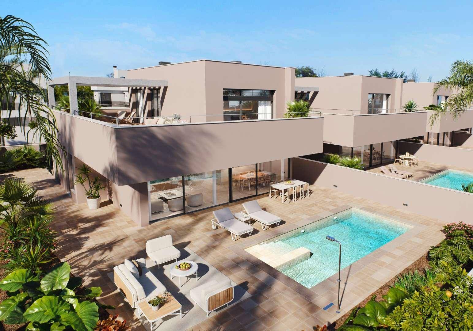 Luftaufnahme einer modernen Wohnanlage mit mehreren Villen, privaten Pools und üppiger Bepflanzung.
