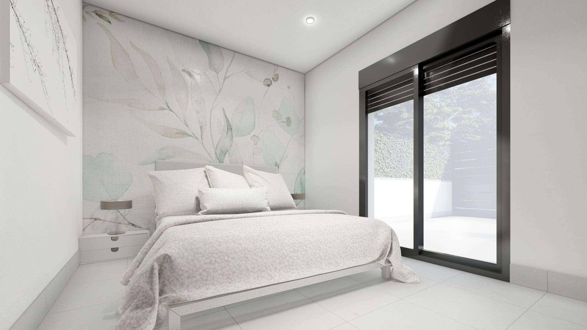 Helles Schlafzimmer mit floraler Tapete, großem Fenster und Zugang zum Außenbereich.