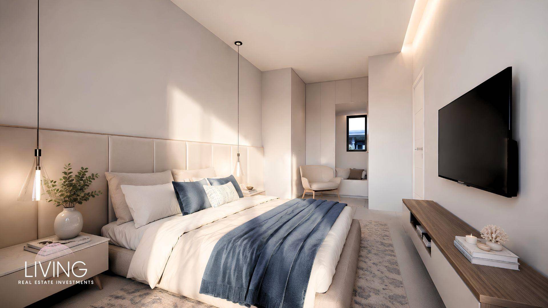 Modernes Schlafzimmer mit großem Doppelbett, Wandfernseher und indirekter Beleuchtung.