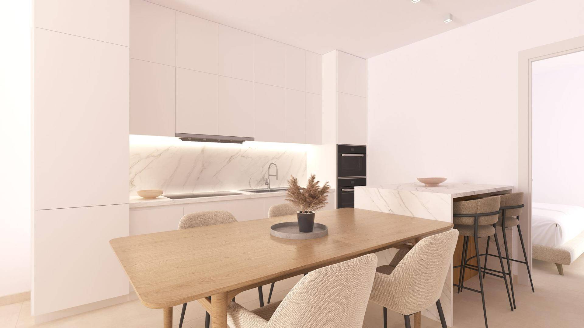 Moderne Küche mit Essbereich, weißen Schränken, Marmorarbeitsplatten und integrierten Geräten.