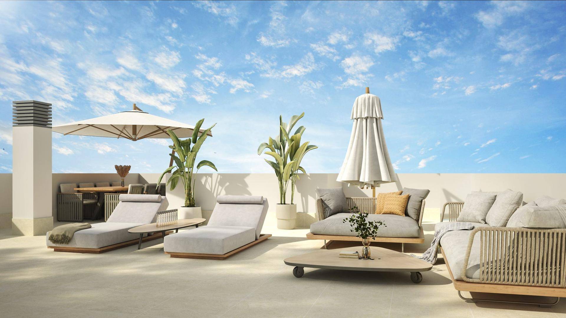Geräumige Dachterrasse mit komfortablen Lounge-Möbeln, Essbereich und Sonnenschirmen.
