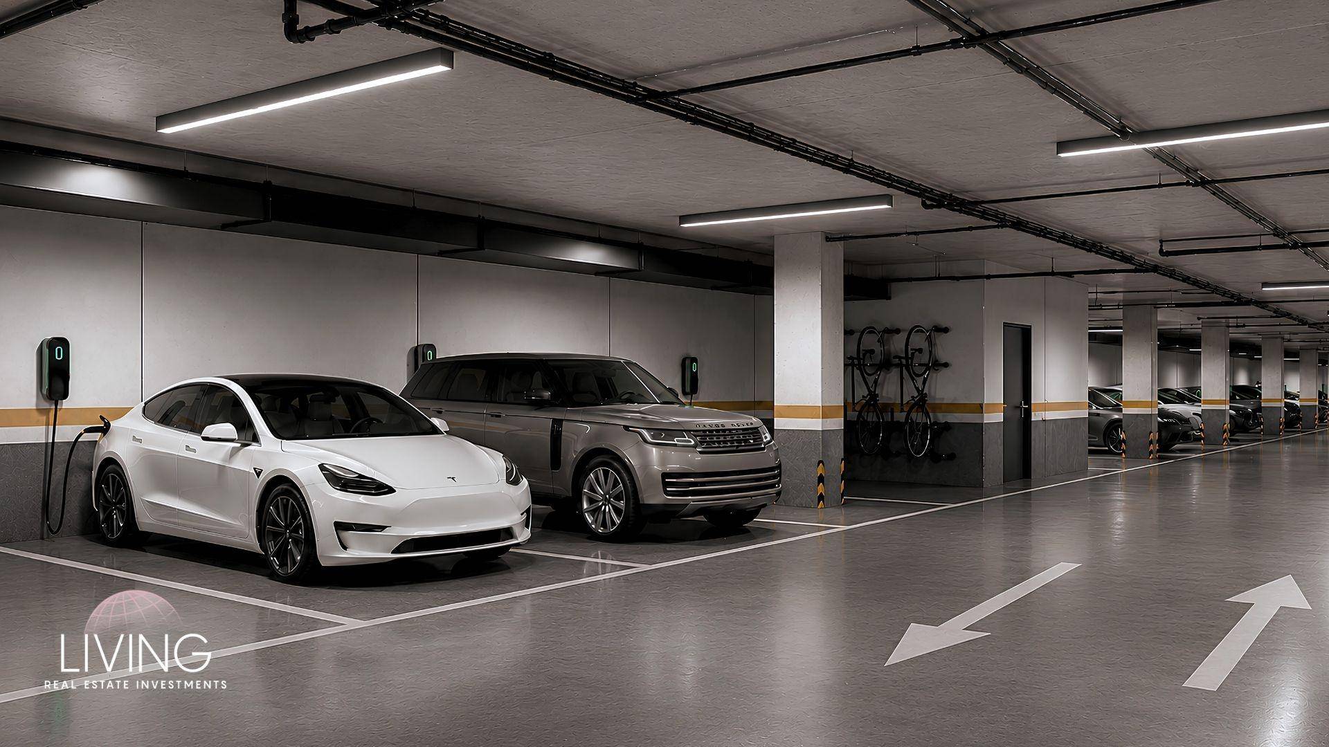 Tiefgarage mit Elektroauto-Ladestationen und Fahrradstellplätzen, bietet sichere Parkmöglichkeiten.