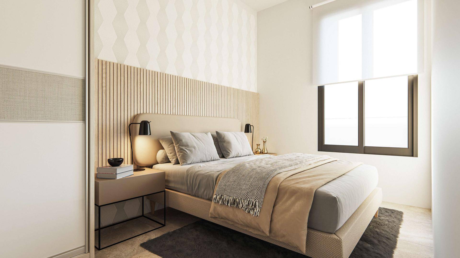 Gemütliches Schlafzimmer mit modernem Design, Holzakzenten und viel Tageslicht durch das Fenster.