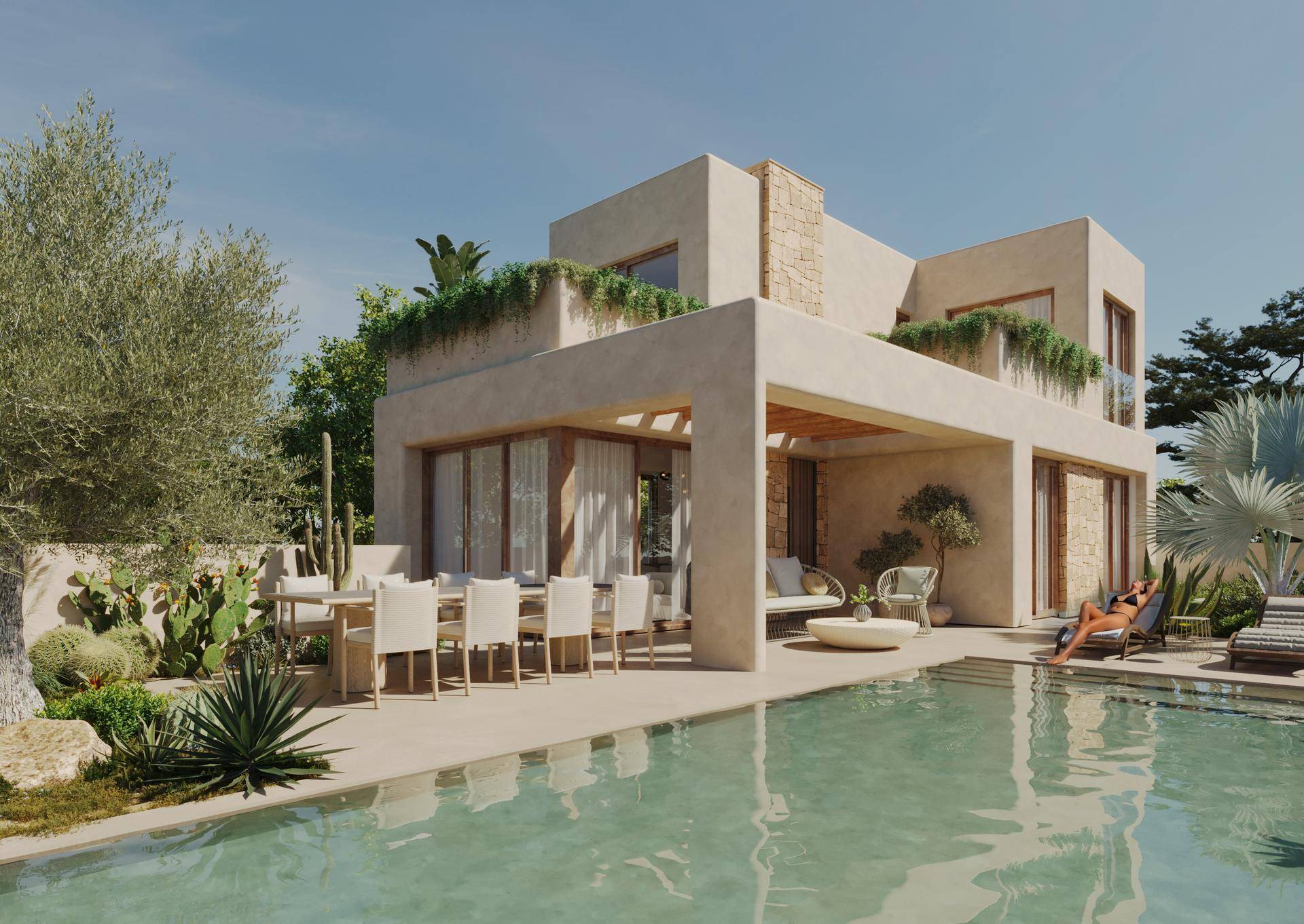 Mediterrane Villa mit großem Pool und sonniger Terrasse, umgeben von üppiger Vegetation.