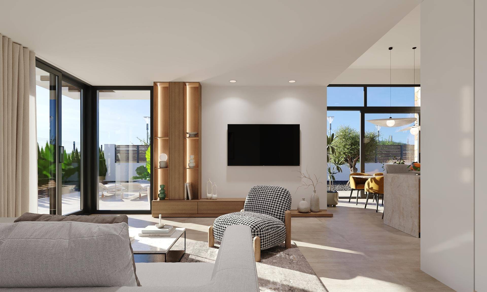 Heller Wohnbereich mit modernem Interieur, großem Fernseher und offenem Übergang zur Küche.