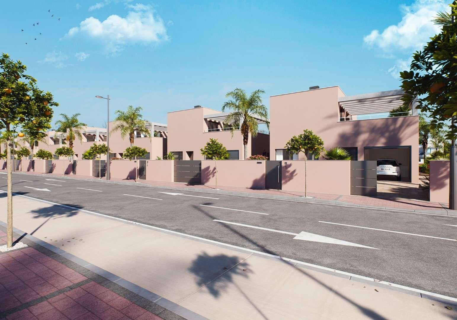 Reihe moderner Villen mit Garagenzufahrten und gepflegten Vorgärten an einer sonnigen Straße.