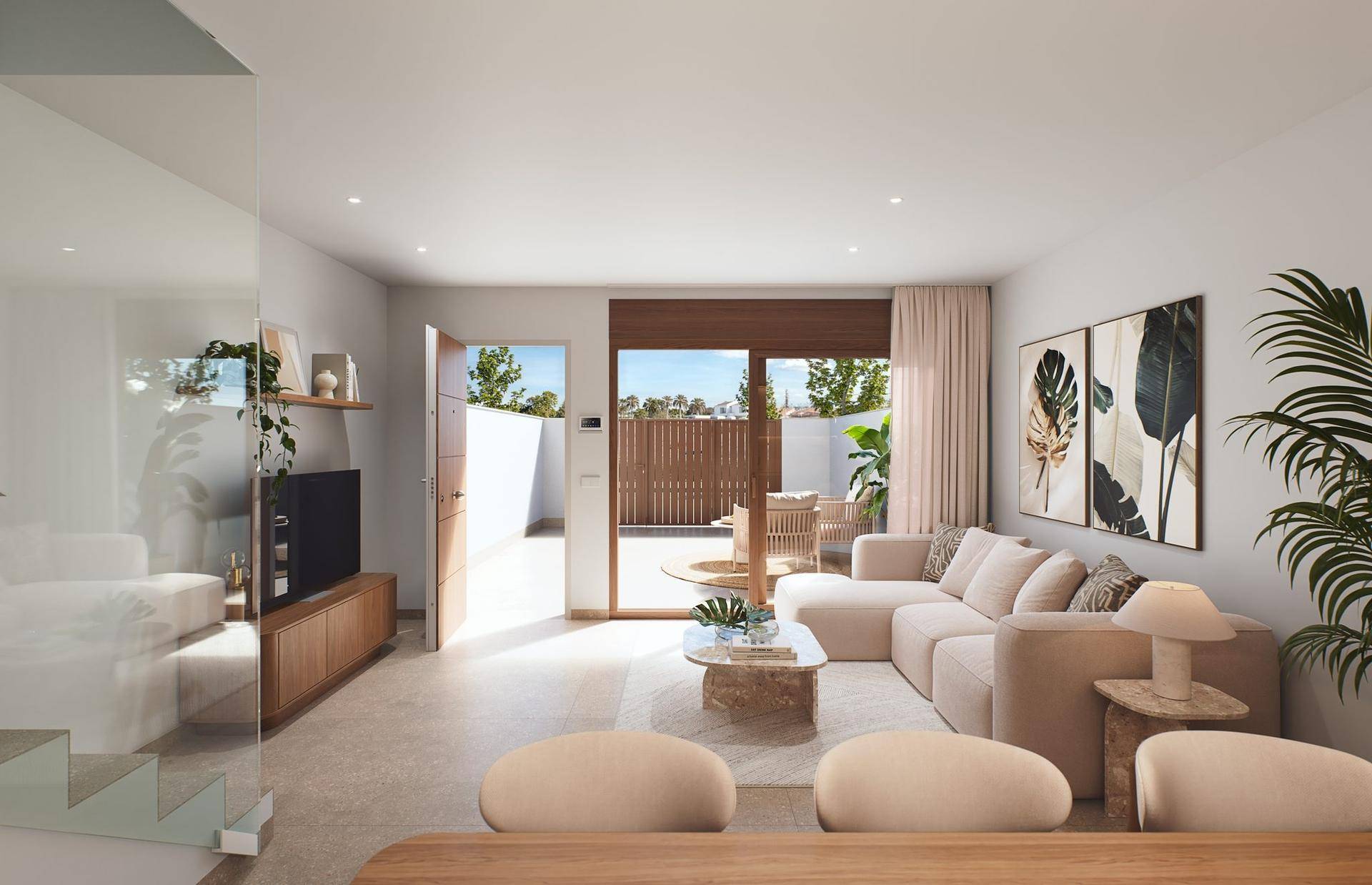 Gemütliches Wohnzimmer mit großem Sofa, TV-Möbel und Zugang zur Außenterrasse.
