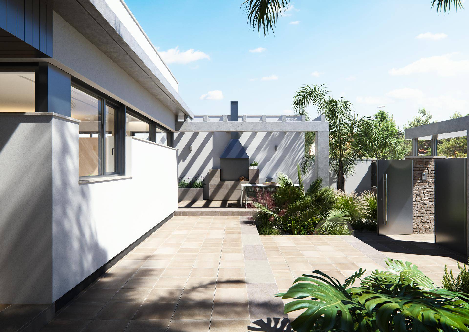 Seitliche Terrasse mit moderner Außenküche und Grillbereich, umgeben von mediterranen Pflanzen.