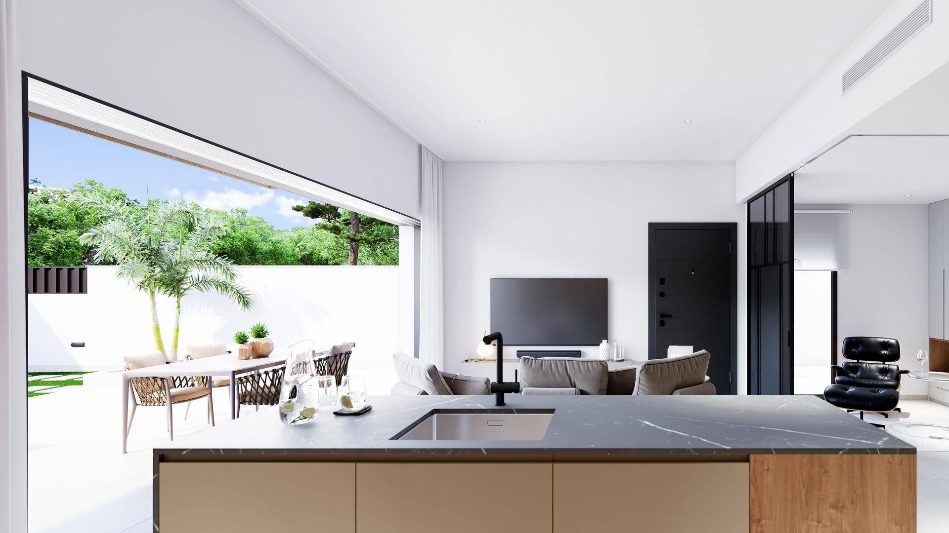 Moderne Küche mit großer Kochinsel und direktem Zugang zum möblierten Außenbereich.
