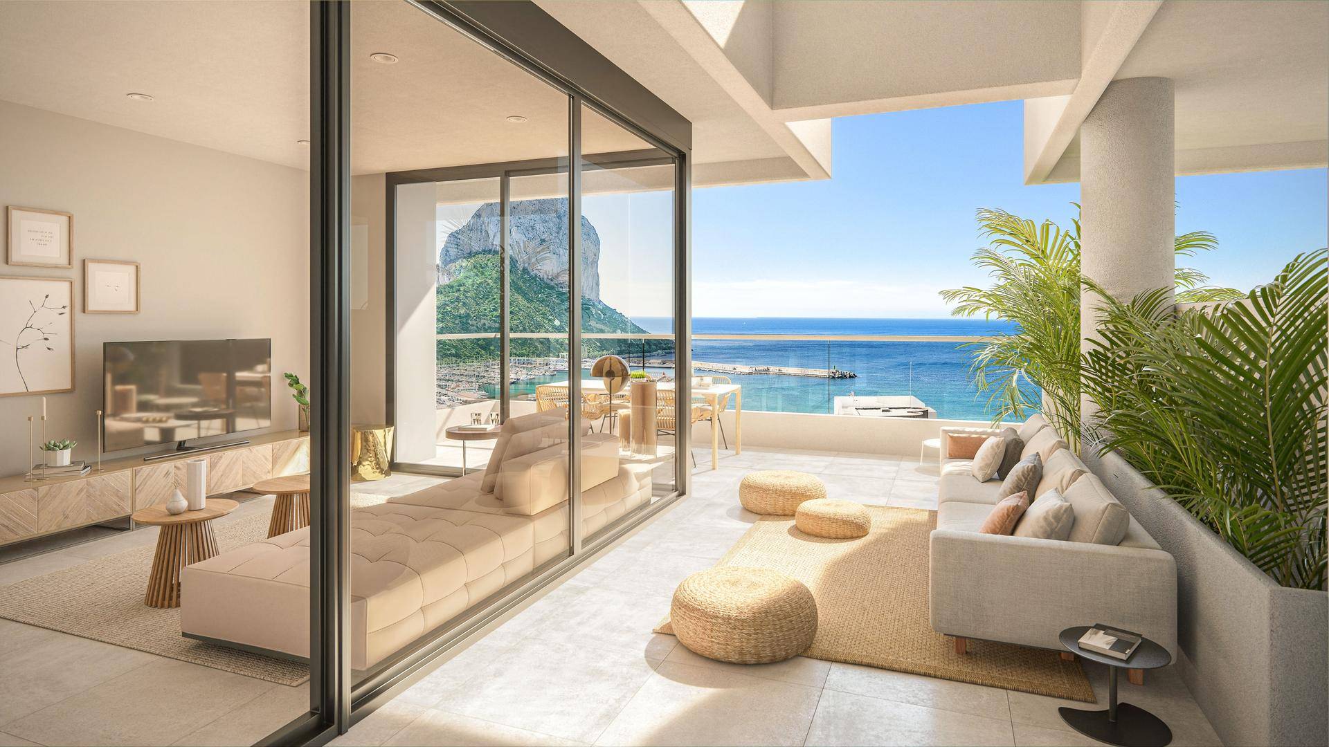 Geräumige Terrasse mit Lounge-Möbeln, Meerblick und direktem Zugang zum Wohnbereich.