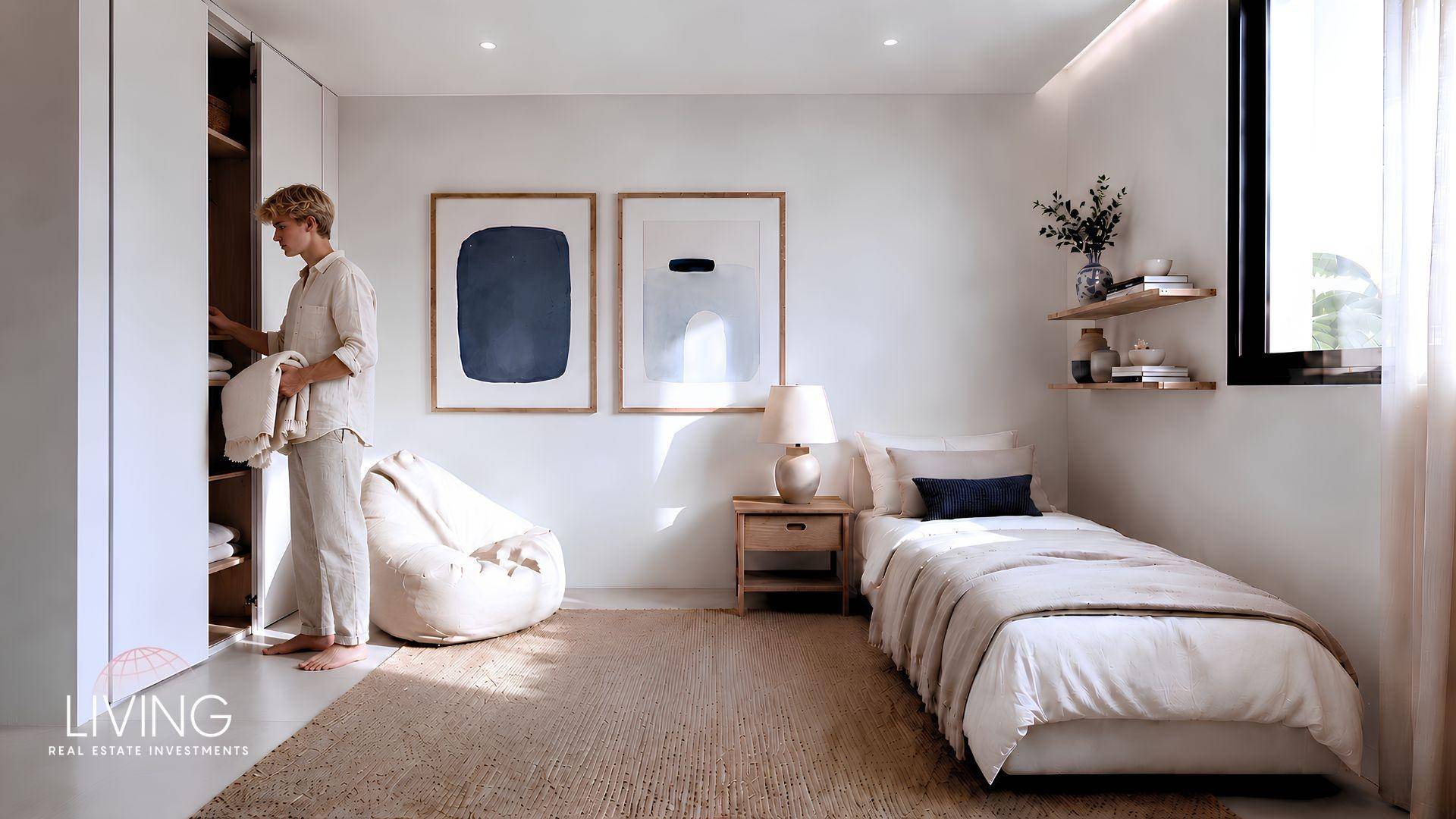 Modernes Schlafzimmer mit Einzelbett, großem Kleiderschrank und minimalistischer Dekoration.