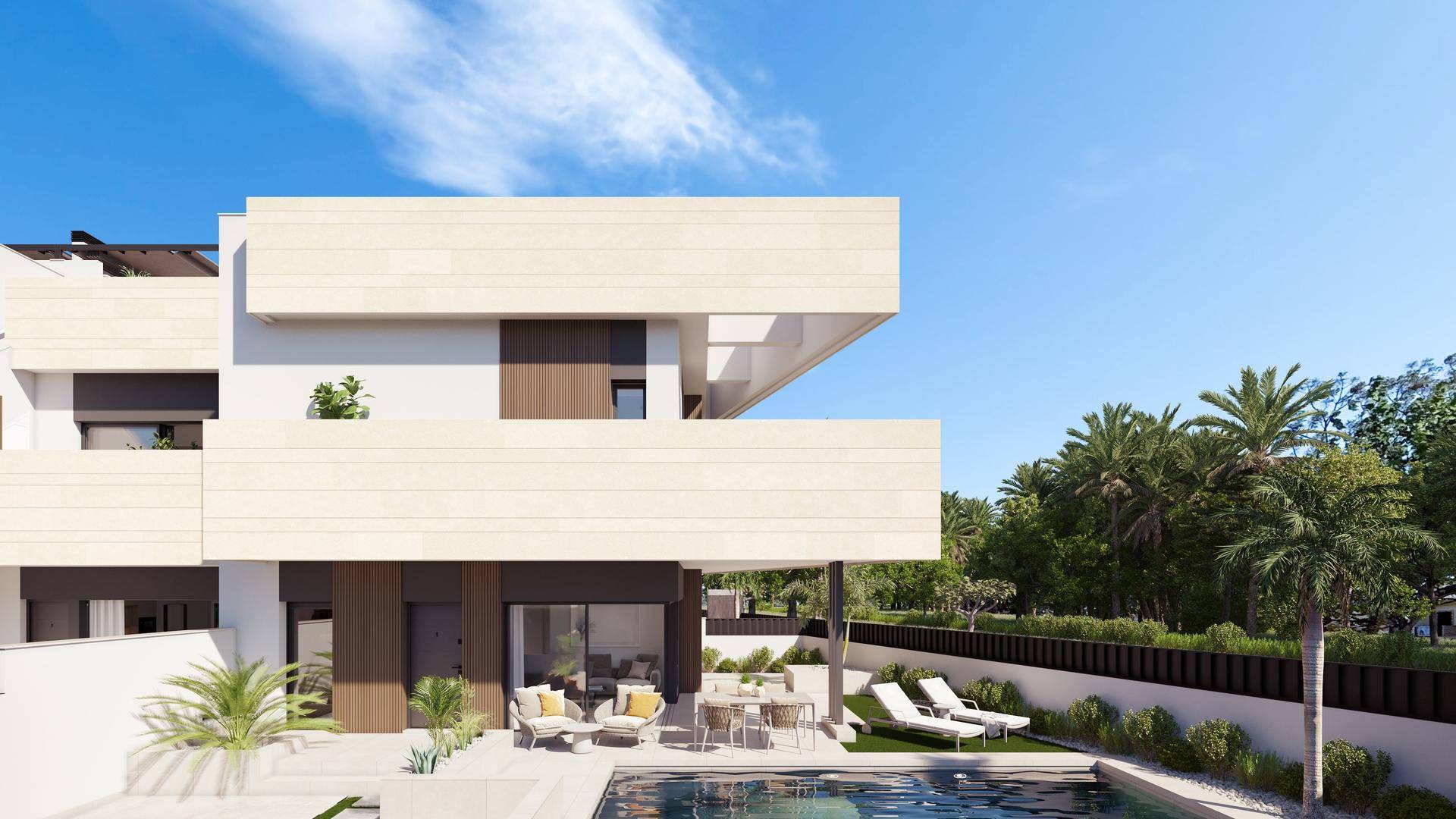 Moderne Villa mit großem Pool, Terrasse und üppigem Gartenbereich unter strahlend blauem Himmel.