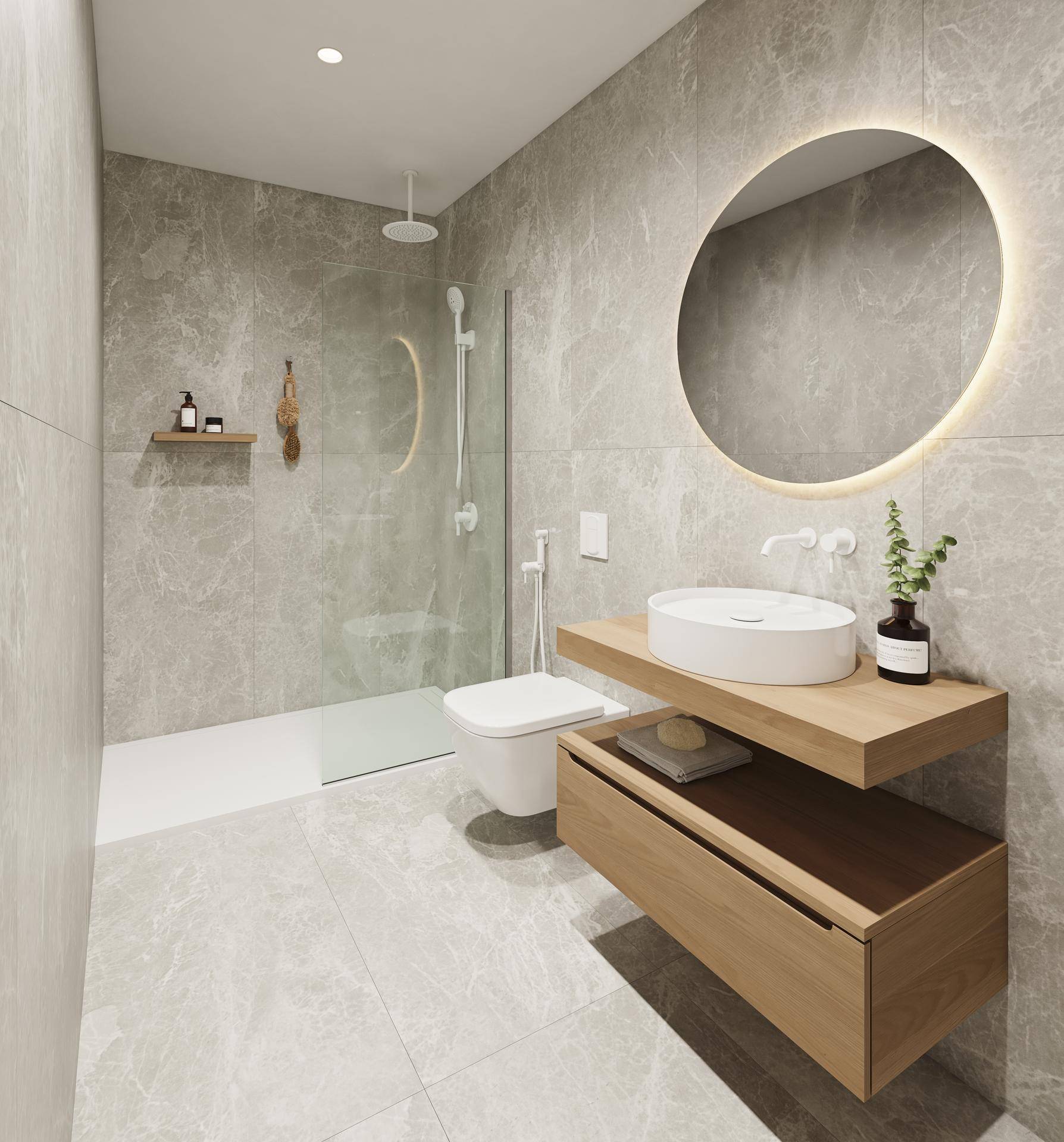 Modernes Badezimmer mit grauen Fliesen, begehbarer Dusche, schwebendem Waschtisch und beleuchtetem Spiegel.