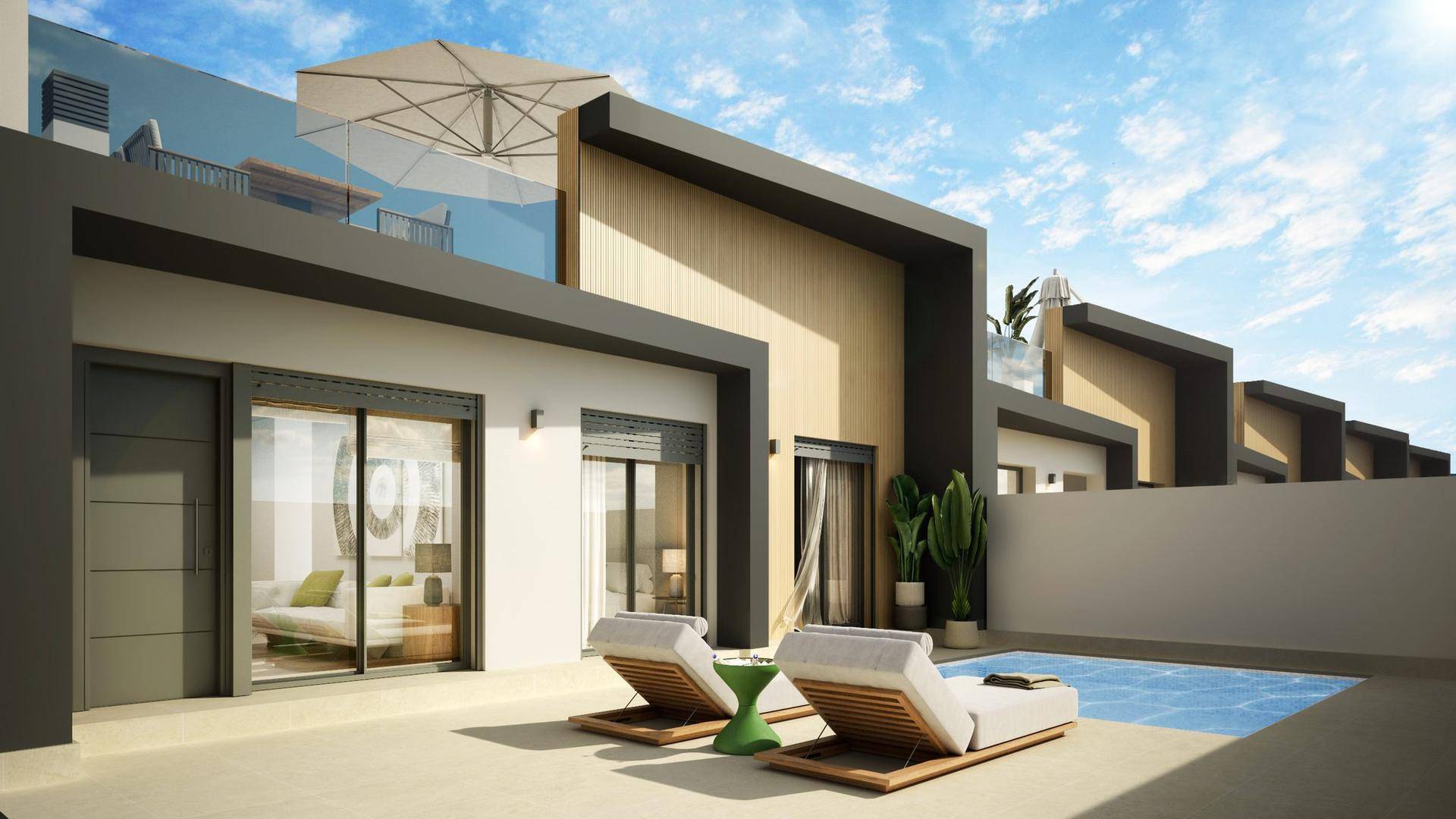 Moderne Fassade eines Reihenhauses mit privatem Pool und Sonnenliegen auf der Terrasse.