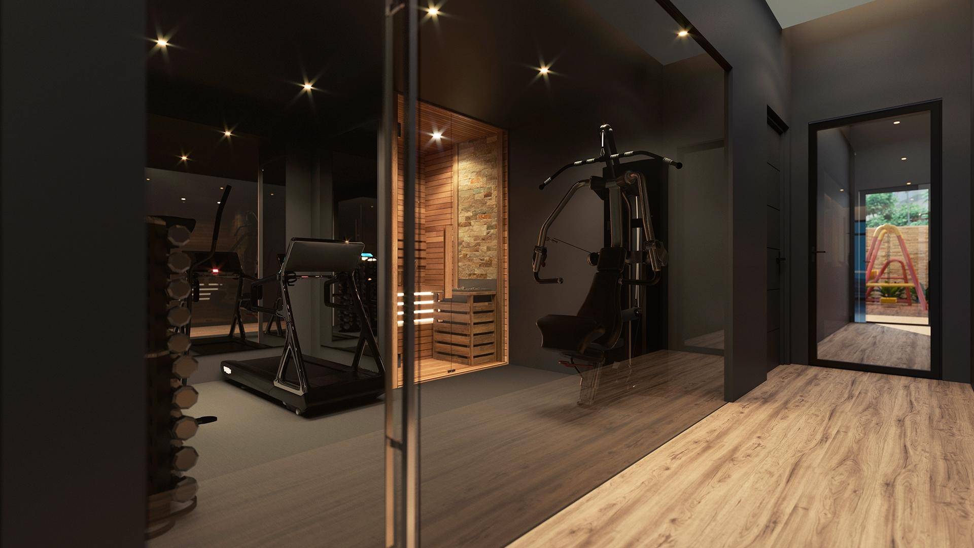 Fitnessbereich mit Sauna und Blick auf einen Spielplatz im Freien.