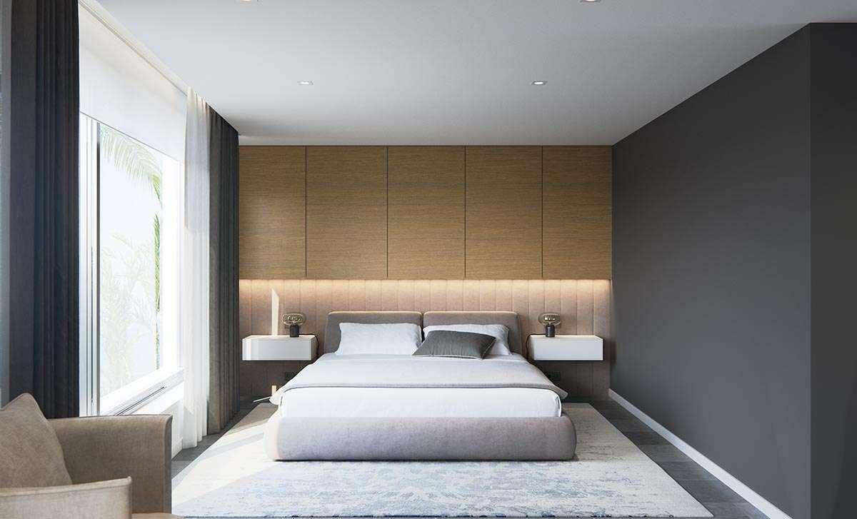 Elegantes Schlafzimmer mit Holzwandverkleidung, indirekter Beleuchtung und modernem Design.