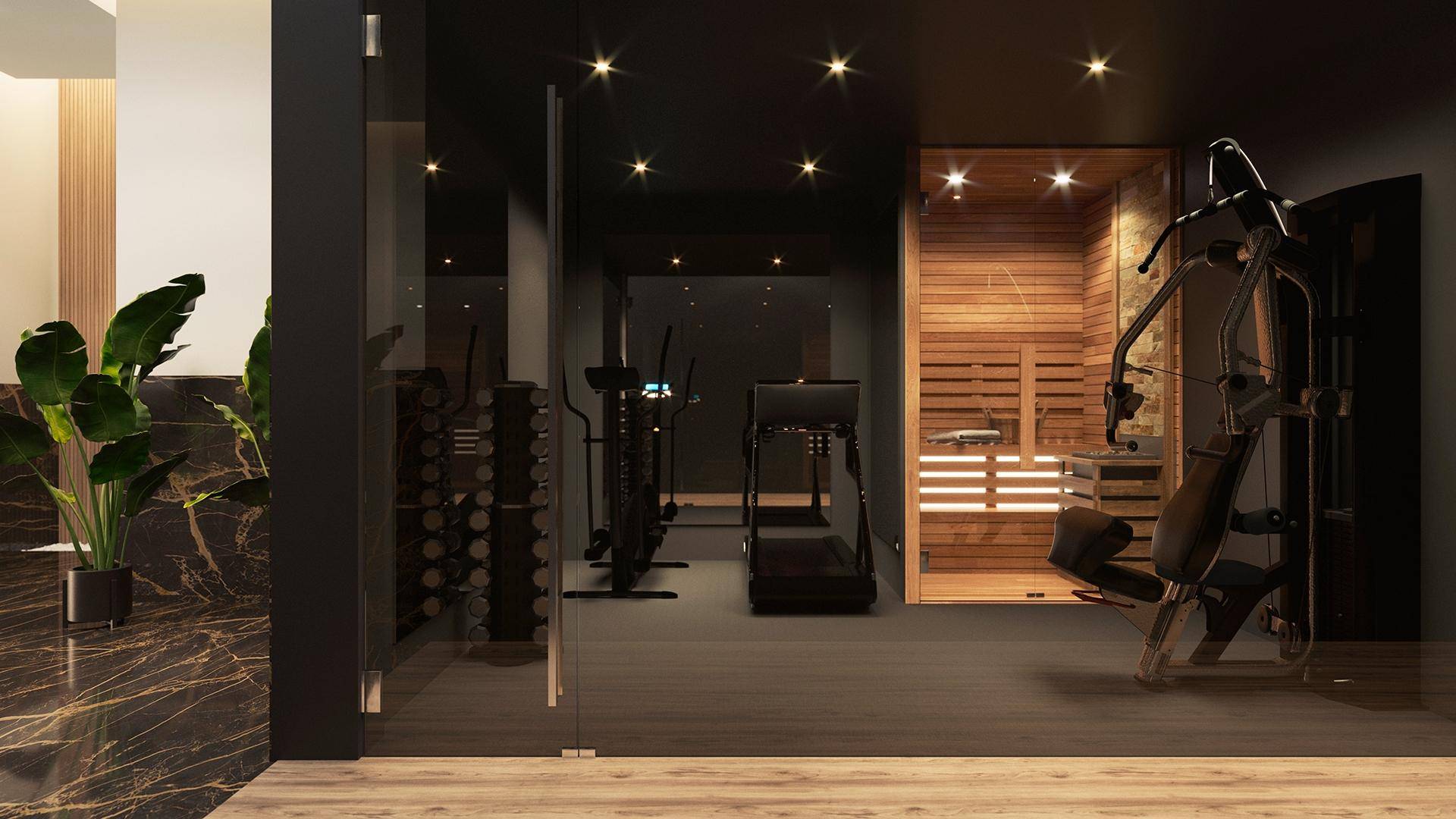 Moderner Fitnessraum mit Trainingsgeräten und integrierter Sauna für Wellness.