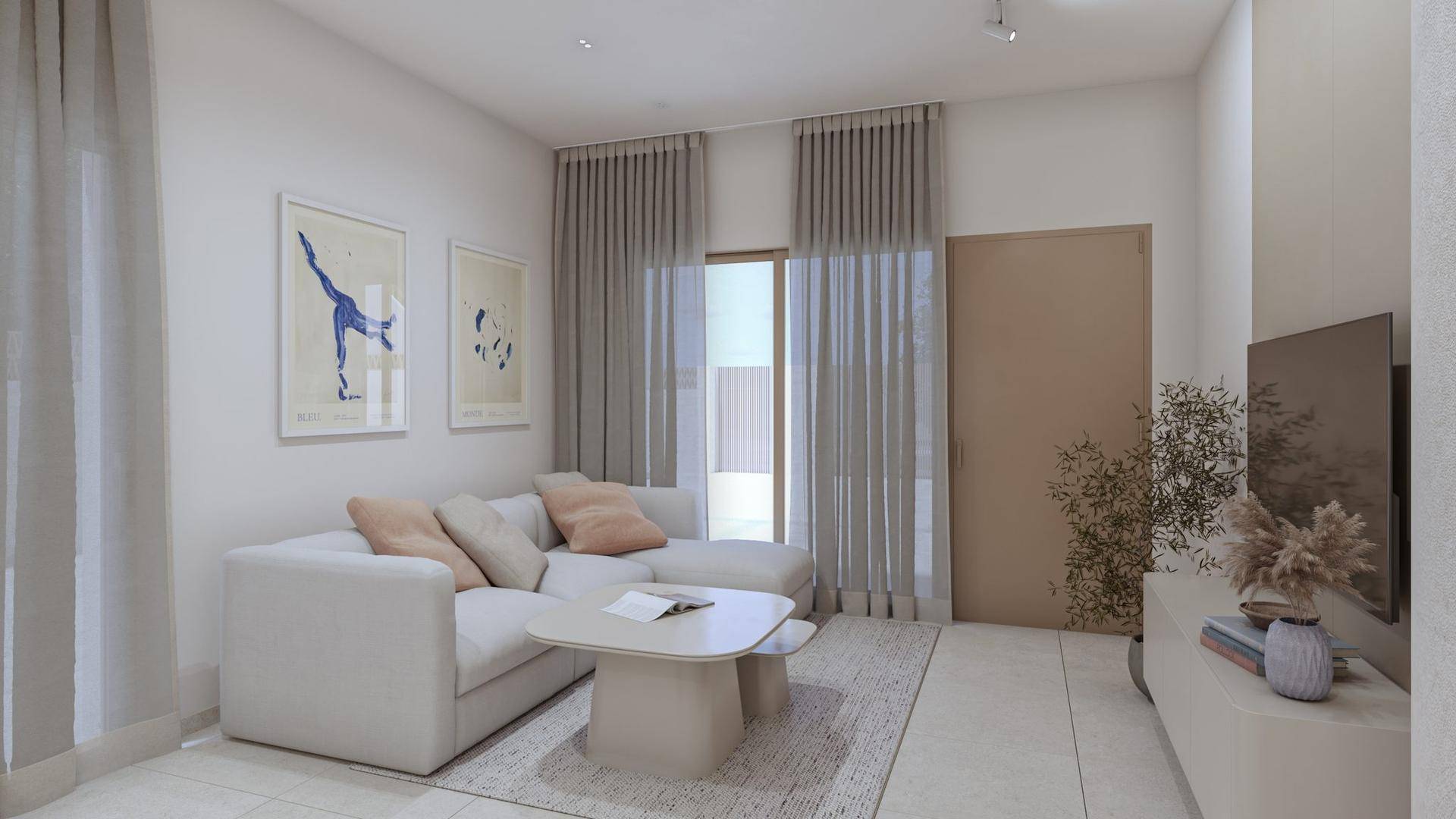 Helles Wohnzimmer mit modernem Sofa, Couchtisch und Zugang zu einer Außenterrasse.
