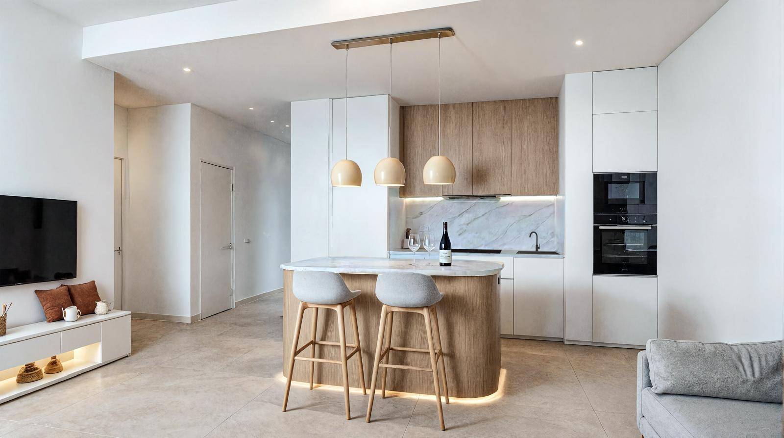 Helle, offene Küche mit Kochinsel und integriertem Wohnbereich in modernem Design.