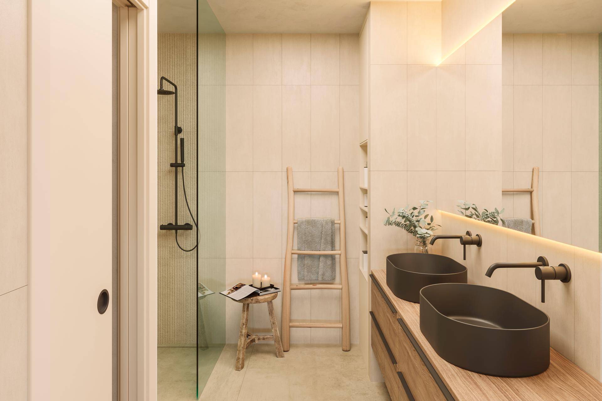 Helles Schlafzimmer mit großem Bett, modernen Bildern und integrierten Kleiderschränken für eine aufgeräumte Optik.