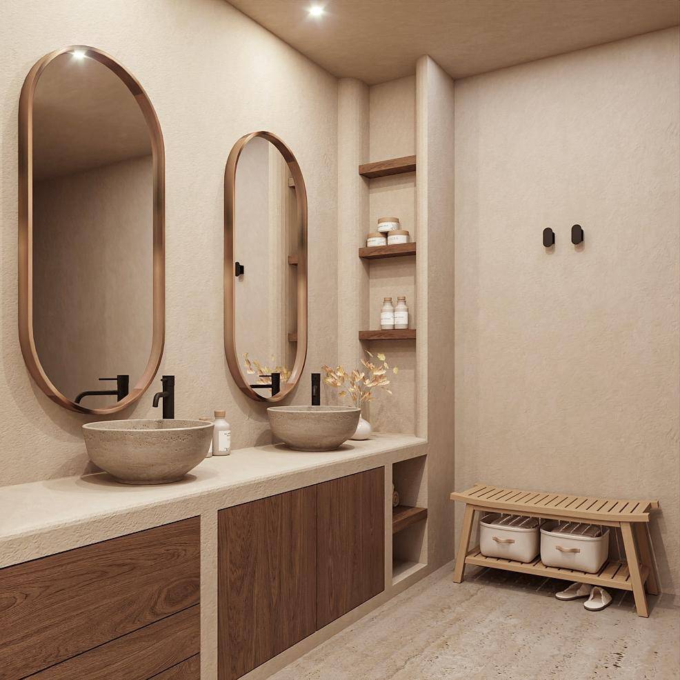 Elegantes Badezimmer mit zwei ovalen Spiegeln, Aufsatzwaschbecken und Holzmöbeln.