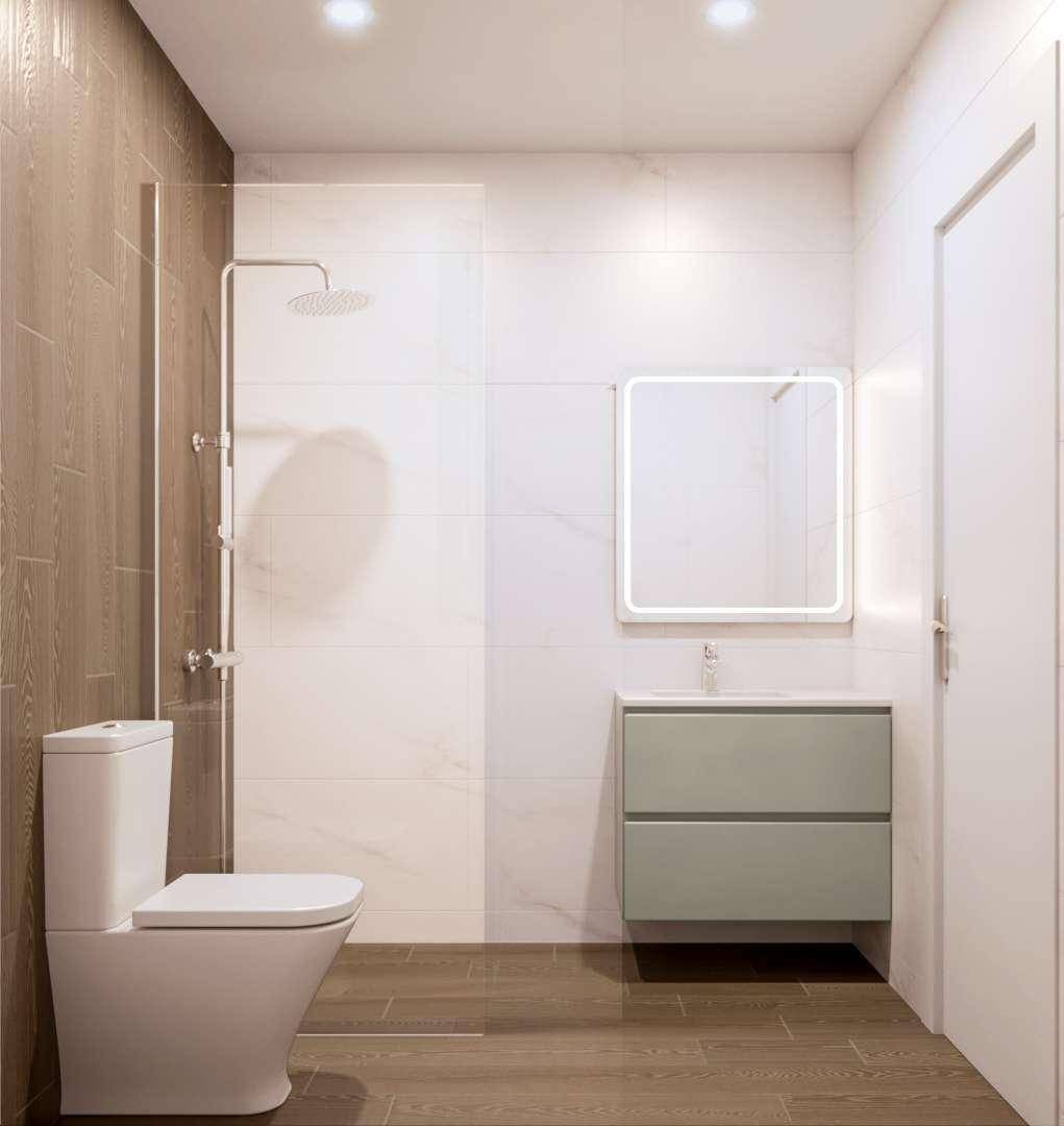 Helles Badezimmer mit begehbarer Dusche, modernem WC und Waschtisch.