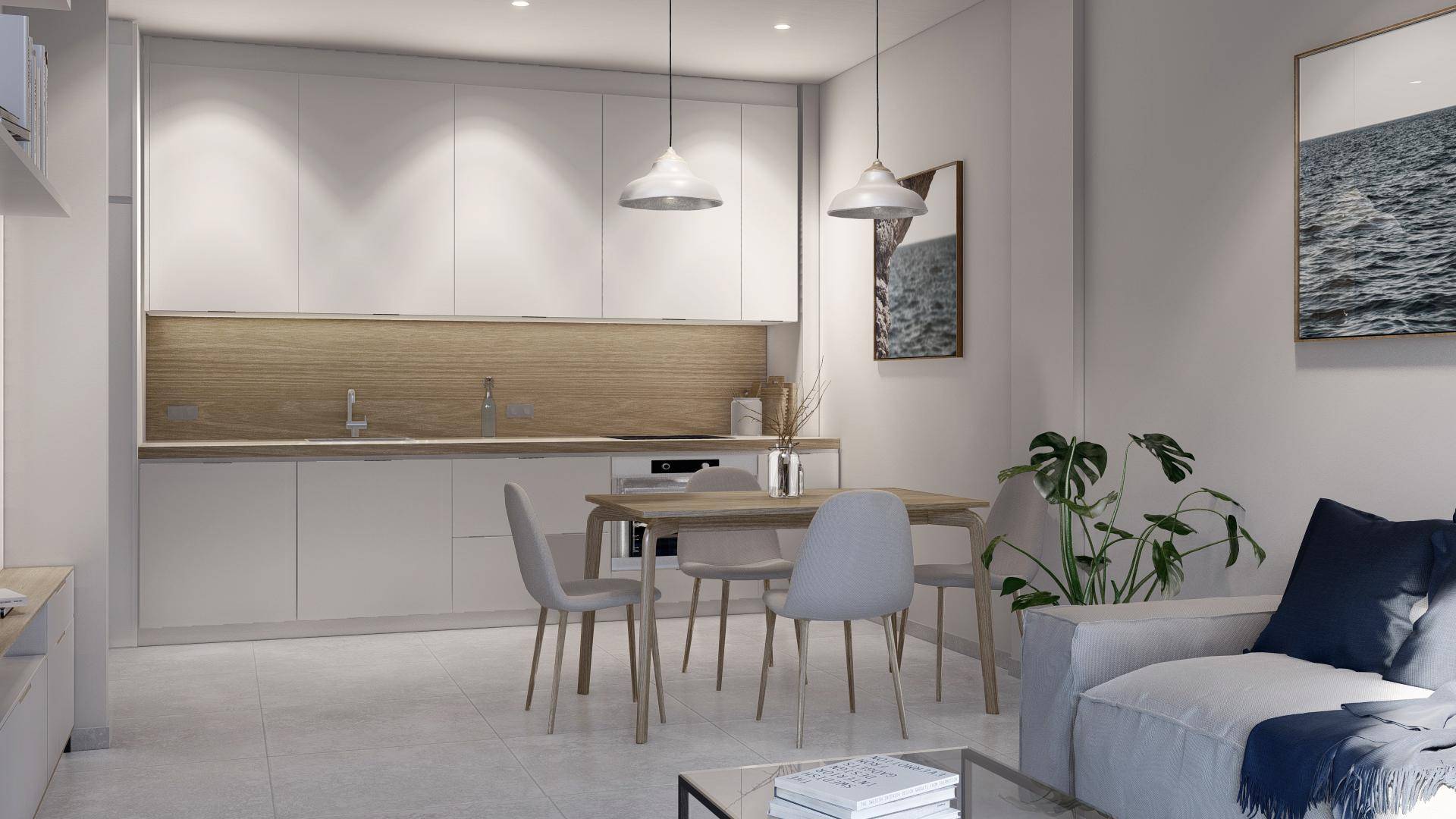 Moderne Einbauküche mit weißen Schränken, Holzakzenten und integriertem Essbereich.
