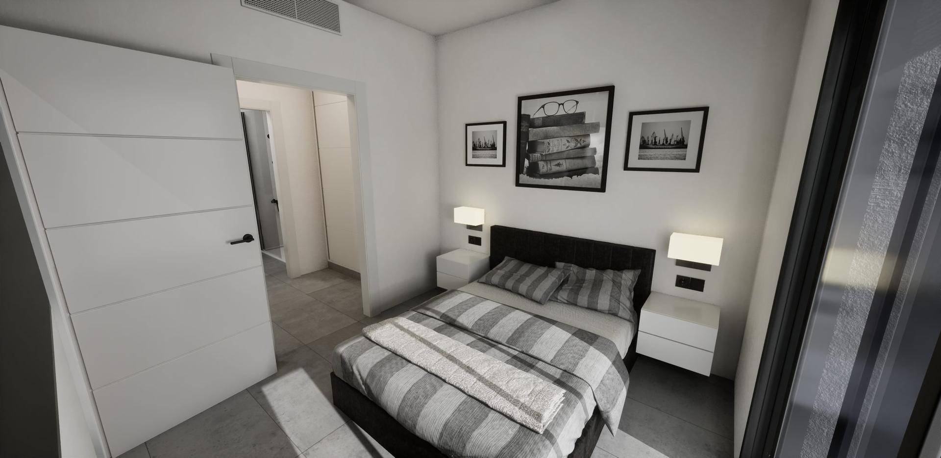 Helles Schlafzimmer mit modernem Bett, minimalistischer Einrichtung und Zugang zum Bad.