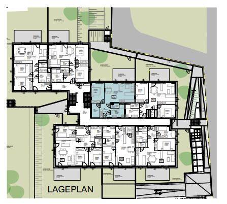 Lageplan der Wohnanlage mit mehreren Wohneinheiten und Außenbereichen.