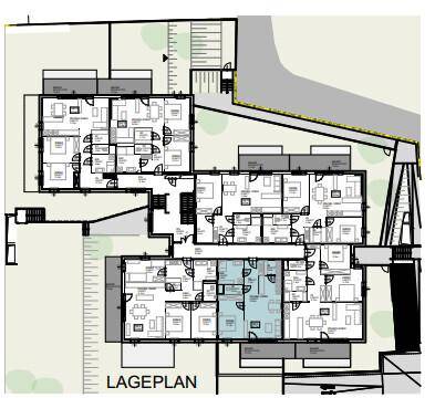 Lageplan der Wohnanlage mit mehreren Wohneinheiten und Außenbereichen.