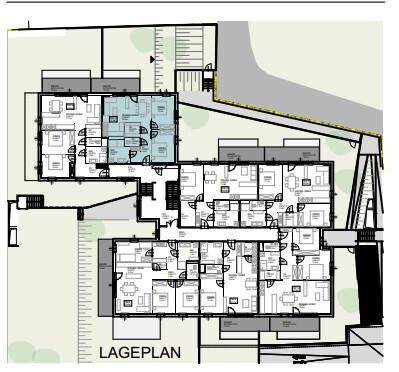 Lageplan der Wohneinheiten auf einer Etage mit hervorgehobener Wohnung und Außenbereichen.