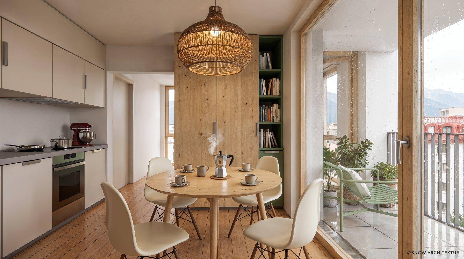 Moderne Wohnküche mit Esstisch, Holzelementen und direktem Zugang zu einem sonnigen Balkon.