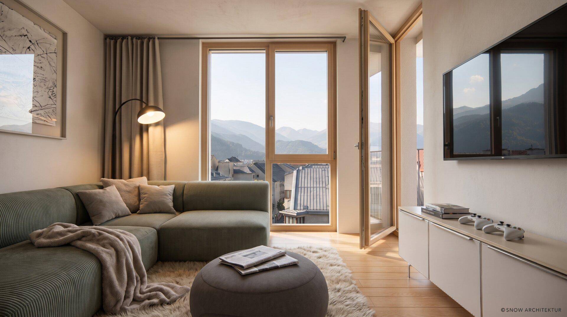 Helles Wohnzimmer mit modernem Sofa, Holzboden und weitem Blick auf die umliegenden Berge.