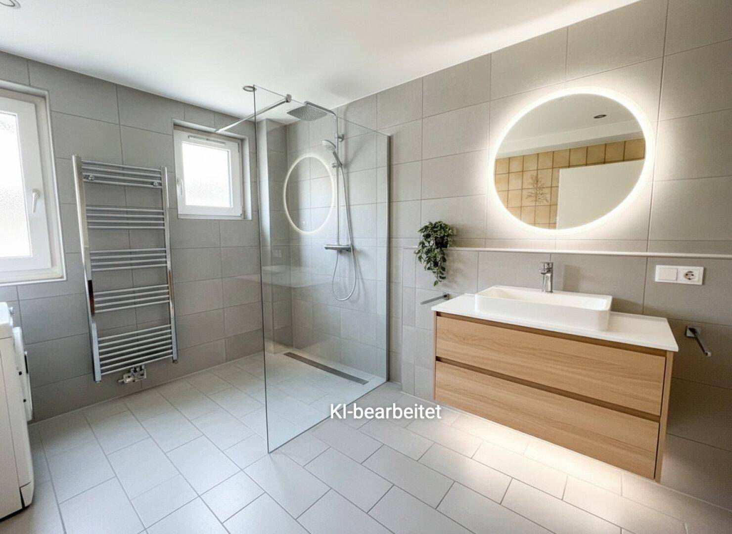 Modernes Badezimmer mit ebenerdiger Dusche, Holzwaschtisch und beleuchtetem Spiegel.