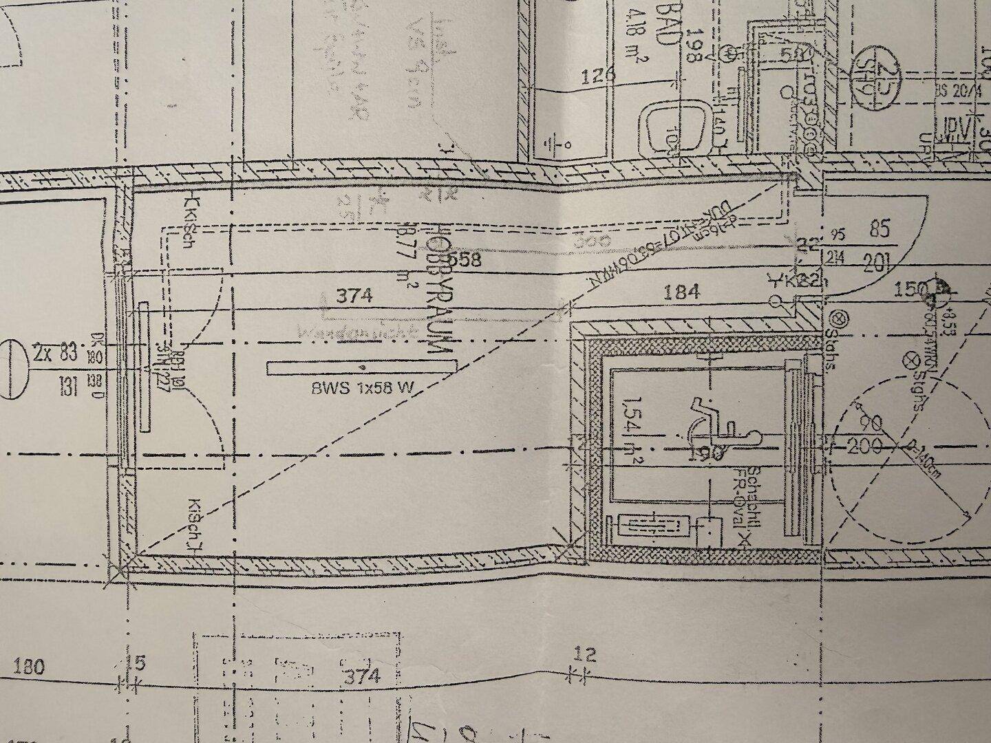 Ausschnitt eines Grundrisses mit Hobbyraum und weiteren Details zur Raumaufteilung.