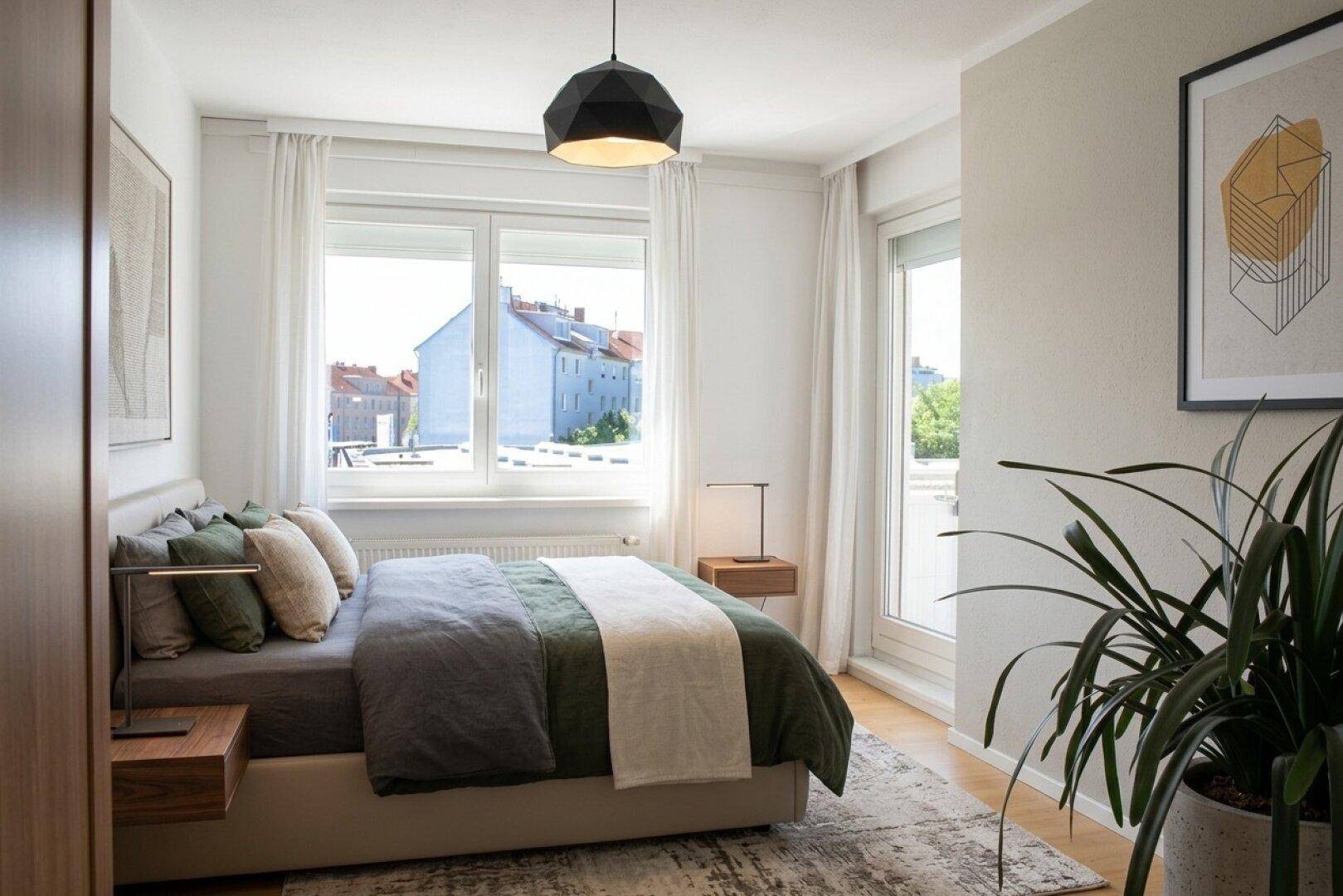 Helles Schlafzimmer mit Holzboden, großem Fenster und Zugang zu einem französischen Balkon.
