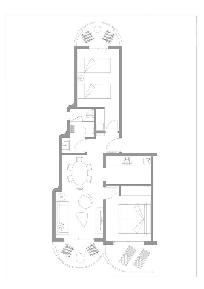 Grundriss einer Wohnung mit zwei Schlafzimmern, Wohnbereich, Küche und zwei Balkonen.