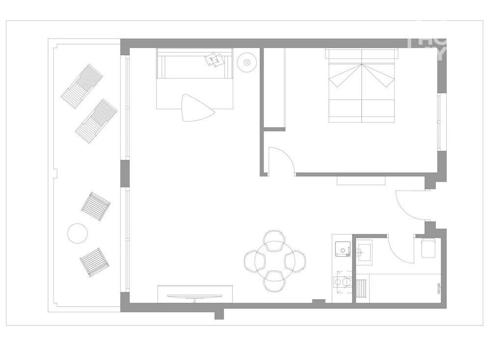 Grundriss einer Wohnung mit Schlafzimmer, Wohnbereich, Küche und großer Terrasse.
