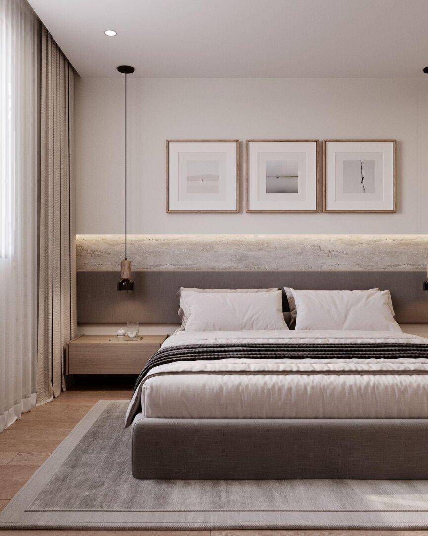 Modernes Schlafzimmer mit großem Bett, stilvollen Nachttischen und hellem Holzboden.