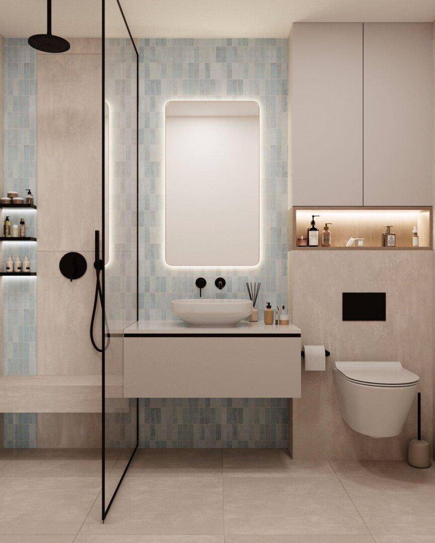 Modernes Badezimmer mit begehbarer Dusche, Wand-WC und beleuchtetem Spiegel über dem Waschbecken.