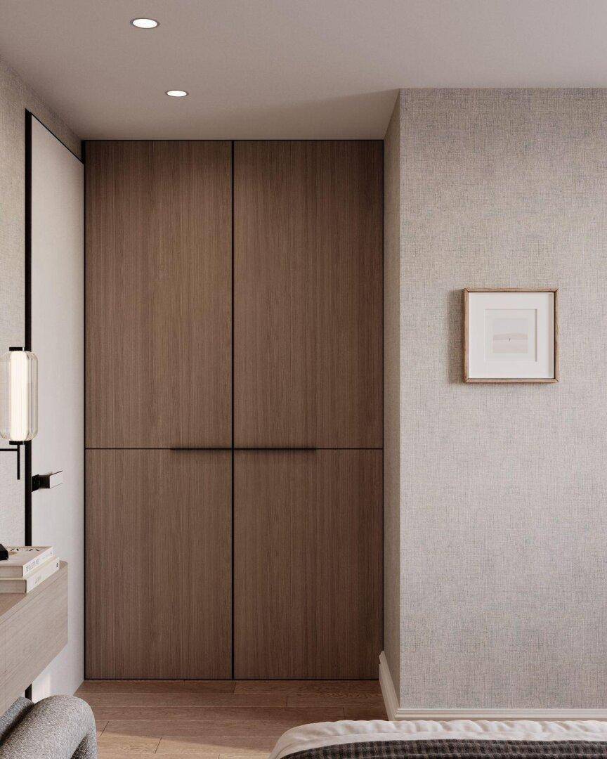 Eingebaute Holzschränke mit minimalistischem Design in einem modernen Raum mit Holzboden.