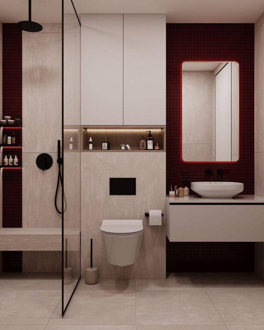 Modernes Badezimmer mit begehbarer Dusche, Wand-WC und stilvollen roten Akzentfliesen.